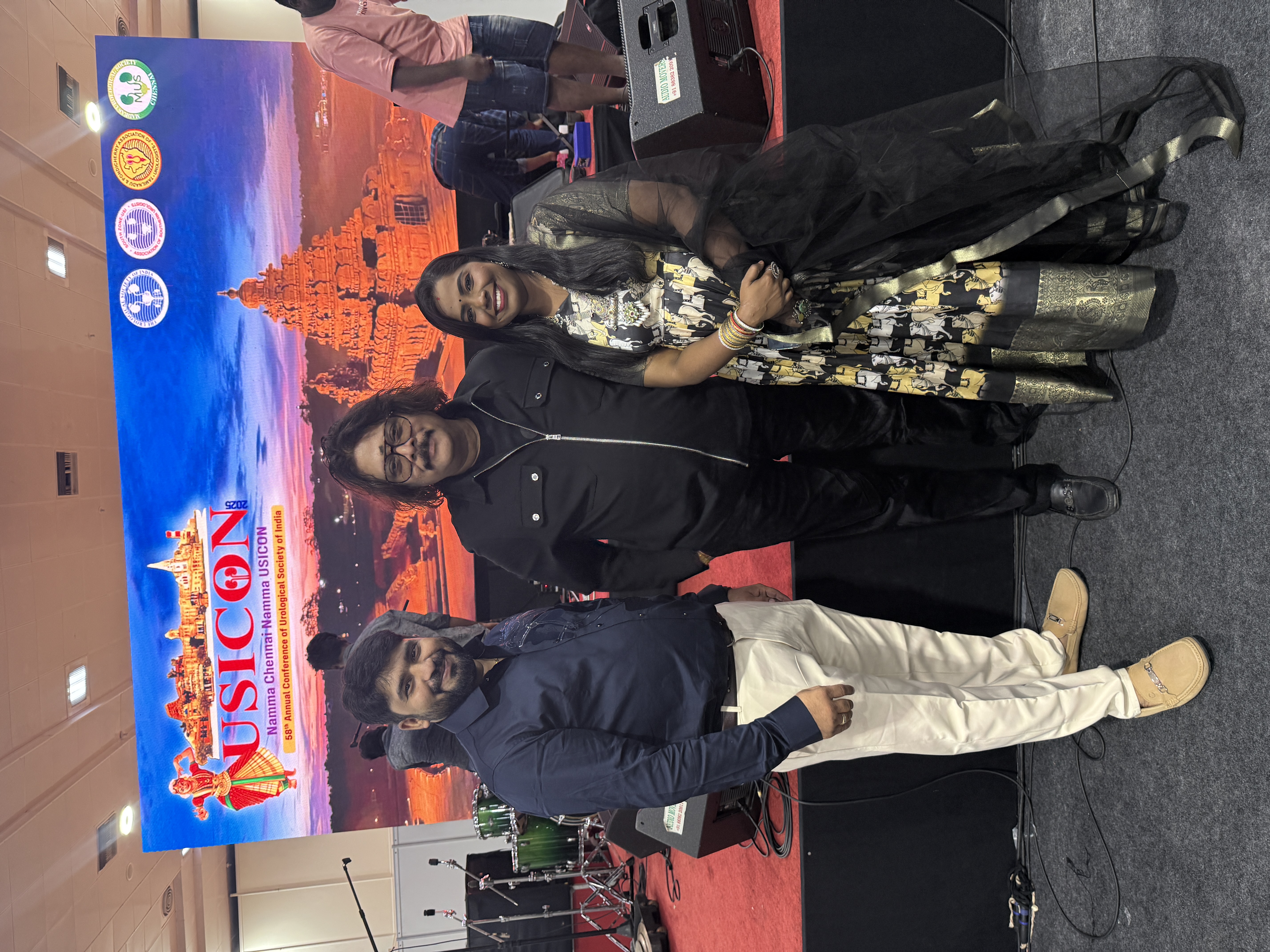 Custom-built exhibition stage and branded backdrop inside a convention centre