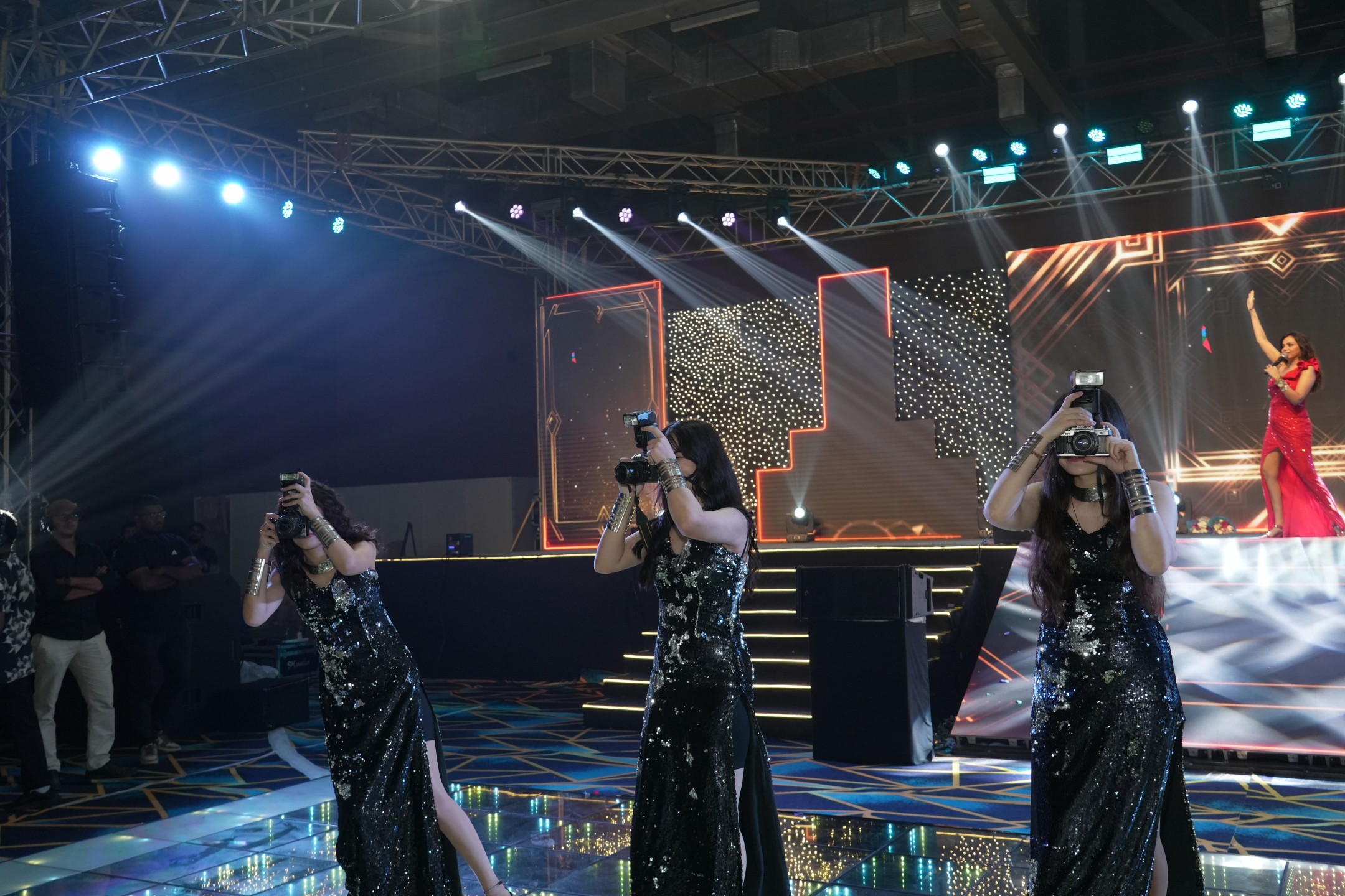 Stage production with dancers, LED wall and full lighting rig at a Pavithram Events show